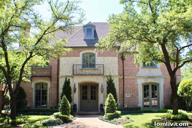 Classic French Traditional exterior of 6902 Oak Manor Drive in Lake Forest