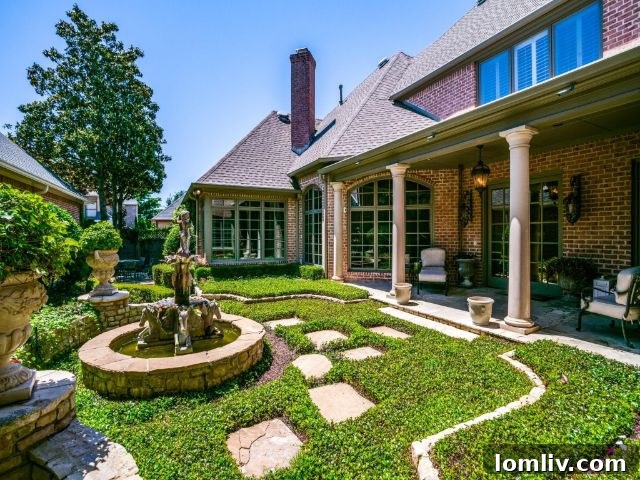 Stunning gourmet kitchen with large island and high-end appliances at 6902 Oak Manor Drive