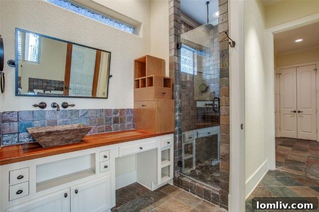 Elegant master bedroom, virtually staged, with direct access to courtyard at 12213 Park Bend Drive