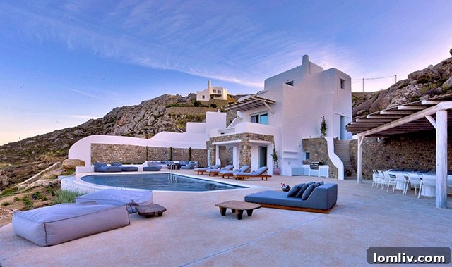 Luxury cliffside villa in Mykonos overlooking the Aegean Sea with an infinity pool