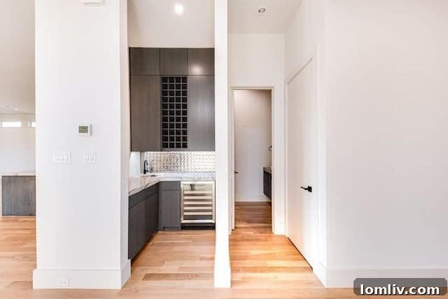 Outdoor patio area leading to a manicured grassy lawn