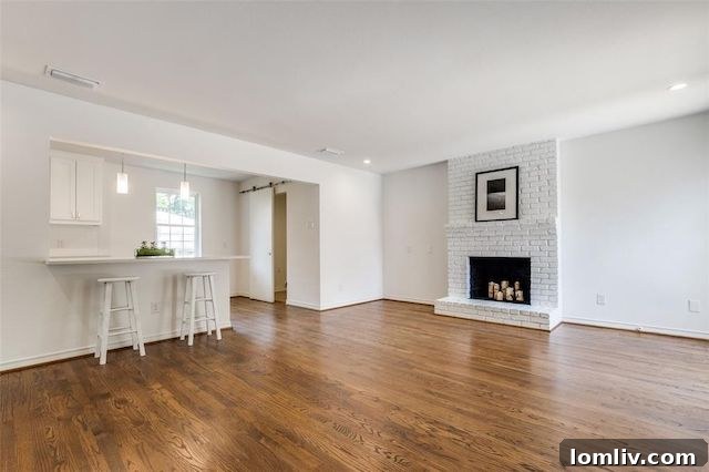 Inviting back deck surrounded by a well-kept lawn