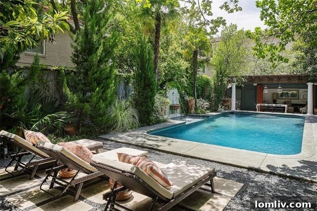 Lush backyard with pool, cabana, and full guest house at 4509 Westway Avenue
