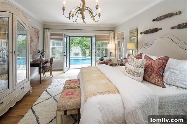 Main bedroom with access to private pool area in Highland Park home