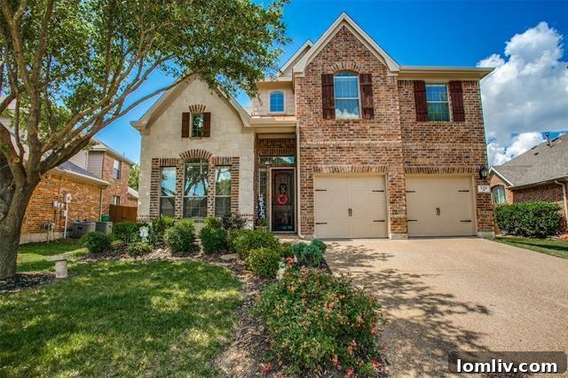 Charming brick home with mature trees and a classic suburban feel in Woodcreek.