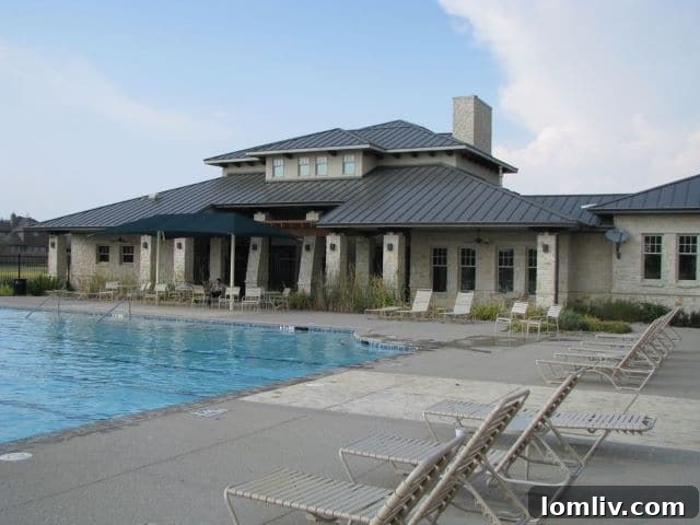 Woodcreek community pool area with lake view.