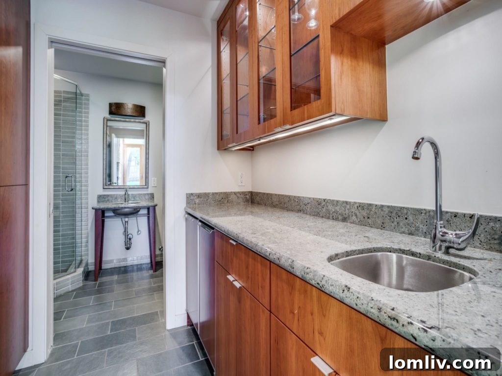 Luxurious principal bedroom suite with ample natural light and elegant decor