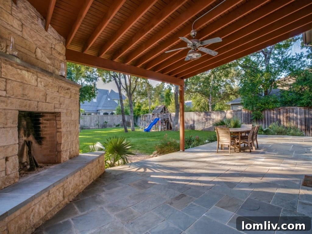 Child's dream backyard at 4411 Pomona with a treehouse, zip-line, and sport court