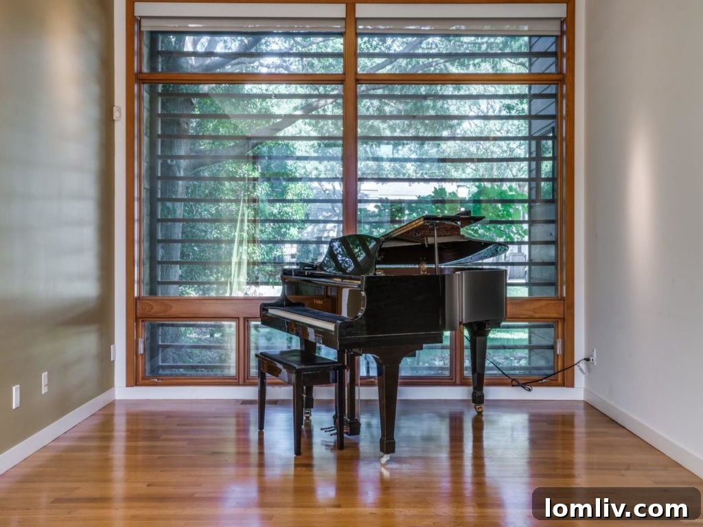 Bright and airy interior space with high ceilings and large windows at 4411 Pomona