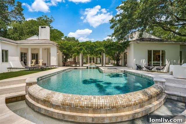 Lease the Bud Oglesby Estate: An Iconic Backdrop for Neiman Marcus Catalogs 13 Modern kitchen with high-end appliances in a Bud Oglesby luxury home.