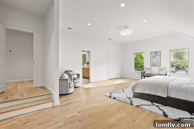 Elegant open concept kitchen with floor-to-ceiling cabinets in Scotsmeadow Drive home
