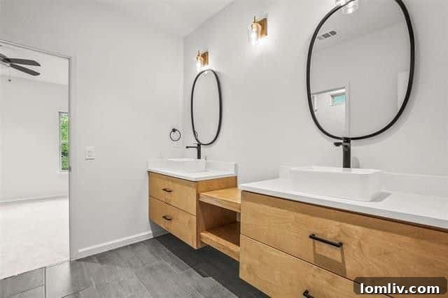 Luxurious master bathroom with hexagonal tiles and modern fixtures