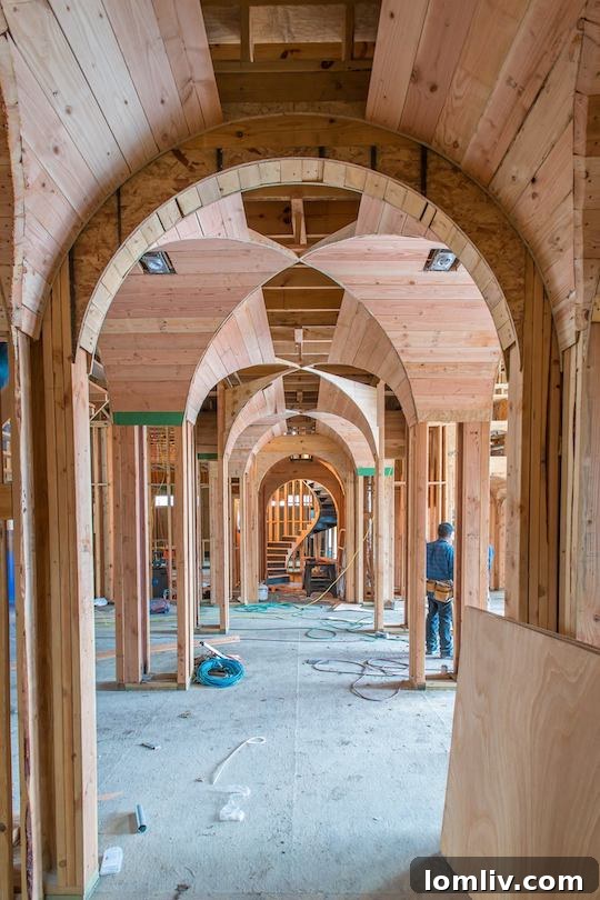 Framed gallery hall in a custom home under construction by Bella Custom Homes