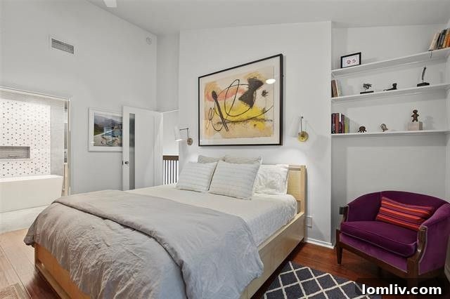 Another inviting view of the master bedroom, emphasizing comfort and the unique elevated perspective.