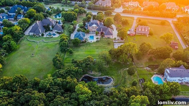 Expansive outdoor living area with a sparkling swimming pool