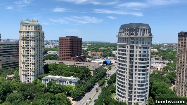 Dallas skyline with modern high-rise buildings, representing the urban condo market