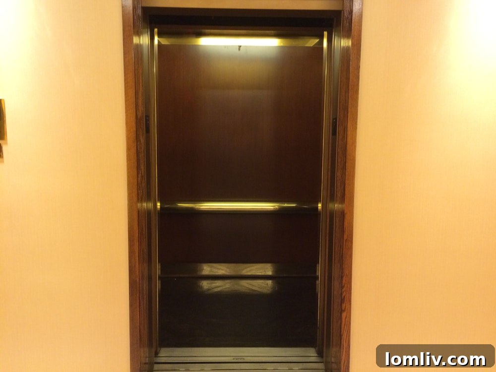 Empty high-rise elevator, demonstrating ease of social distancing in condo common areas
