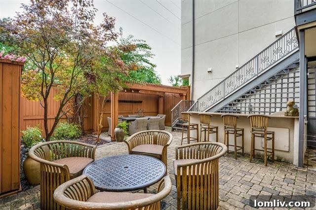 Sophisticated outdoor entertaining area with a built-in grill and wet bar