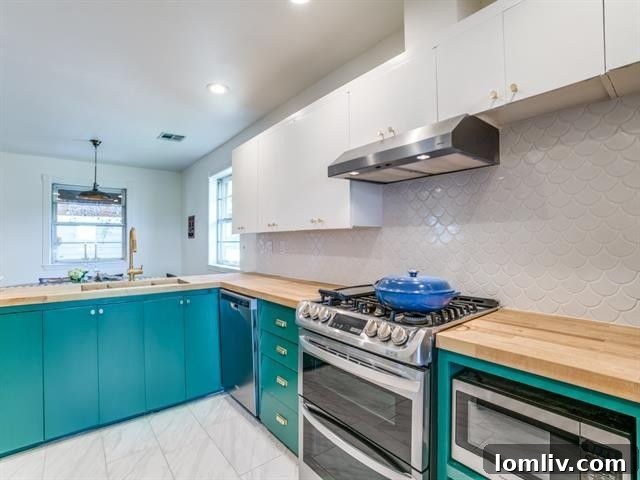 Charming retro-inspired kitchen with a breakfast nook, stylish cabinetry, and bright lighting.