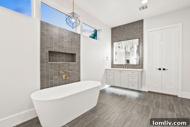 Exterior view of a modern luxury residence with landscaped garden