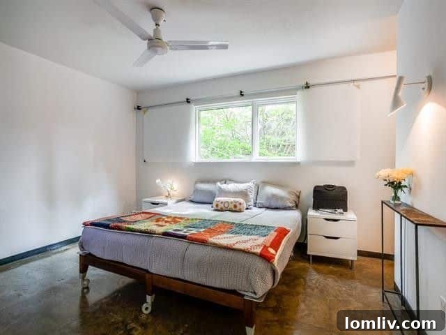 Leading Lighting Designer Tully Weiss' Lakewood Home Hits the Market 14 Serene principal bathroom resembling modern art with ipe-floored shower