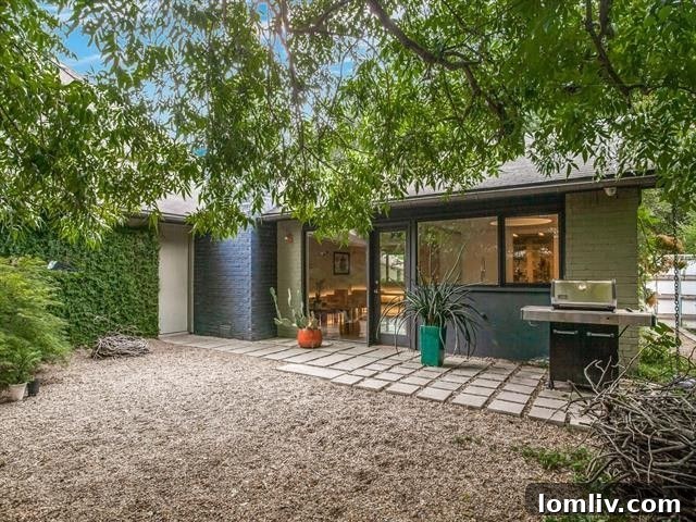 Leading Lighting Designer Tully Weiss' Lakewood Home Hits the Market 16 Lush green pathway leading to White Rock Trail from Lakewood home