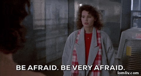 Unique fireplace design with a whimsical, tooth-like pattern in Geena Davis's living room