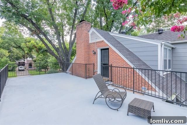 Second bedroom with private deck access overlooking garden