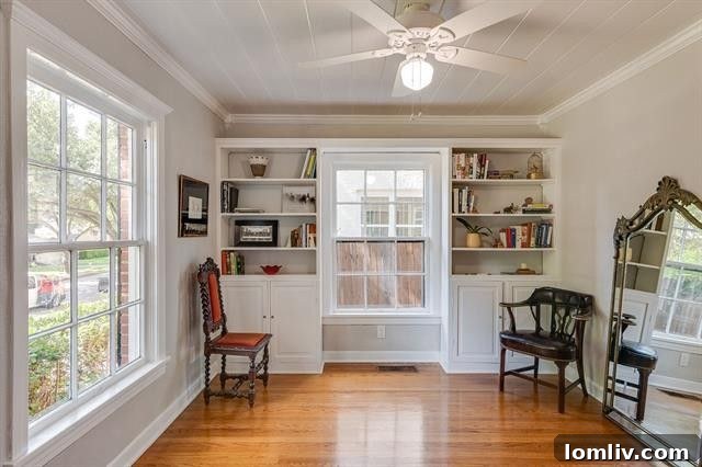 Formal dining room with built-ins currently used as study