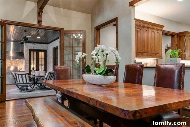 Another perspective of the expansive backyard and green space