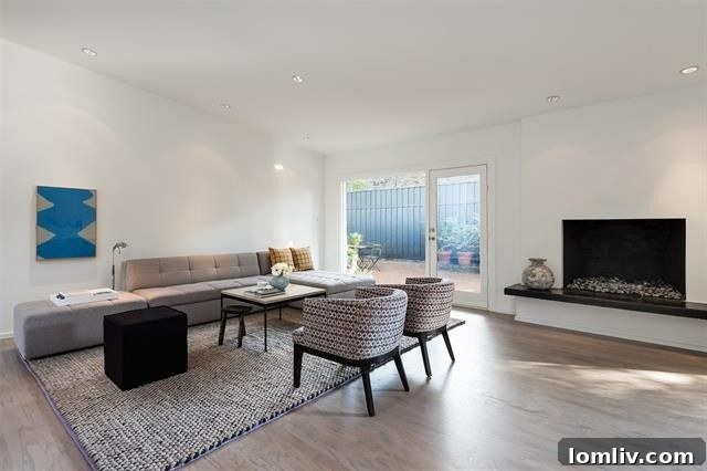 Private resort-like backyard of Midcentury Modern Dallas home, surrounded by lush fencing