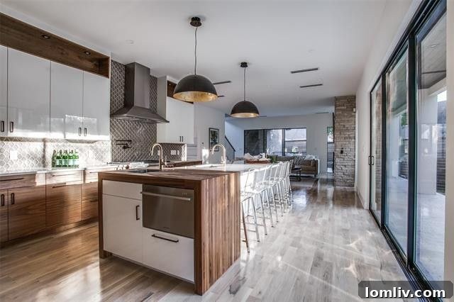 Modern Gourmet Kitchen with Walnut and High-Gloss Cabinetry