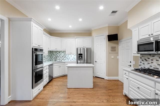Kitchen Detail with Granite Countertops and Tile Backsplash