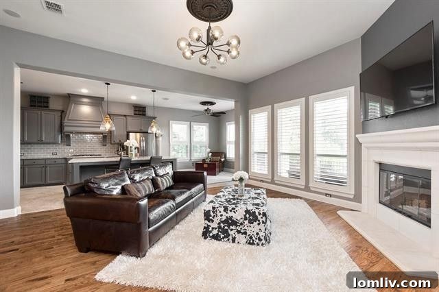 Elegant kitchen with gray cabinets and new lighting in Roanoke home.