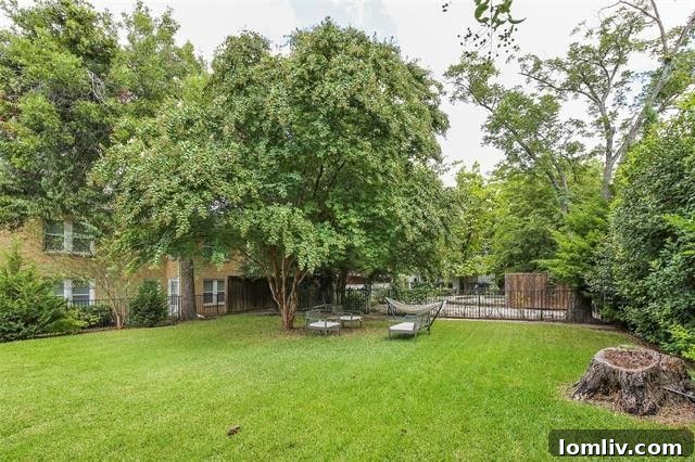 Expansive Lakewood lot viewed from the backyard, showing the significant depth and potential