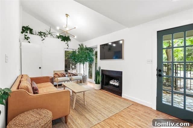 Bedroom with abundant natural light, showcasing potential as a home office