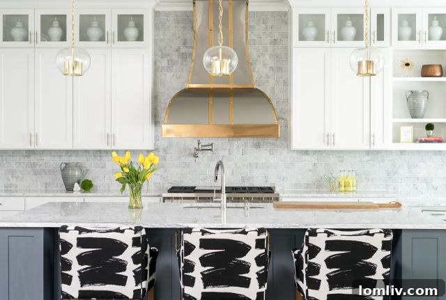 Modern kitchen with unique lighting fixture over the island