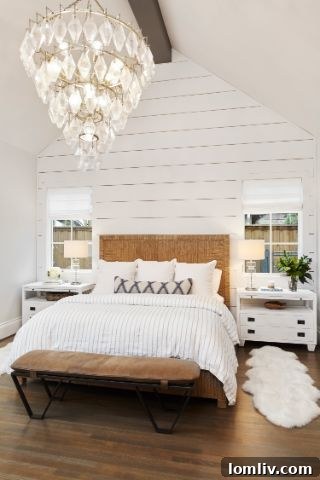 Elegant owner's suite with a chandelier