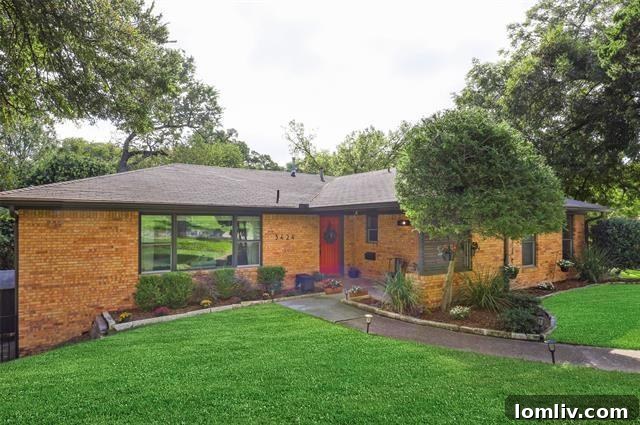 The welcoming exterior of a Midcentury Modern home on Franklin Street, surrounded by mature trees.