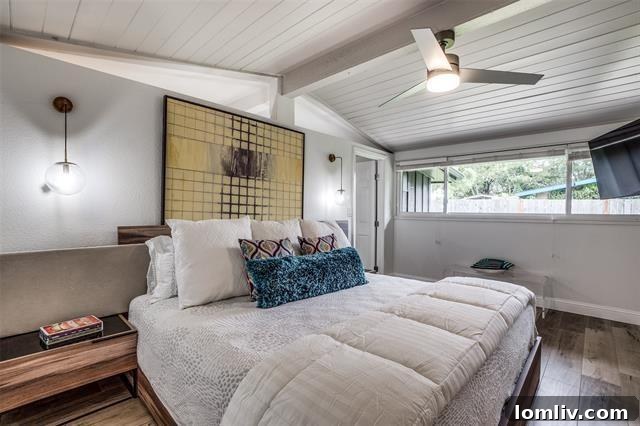 The spacious and inviting backyard of a Cliff May Midcentury Modern home, perfect for outdoor living.