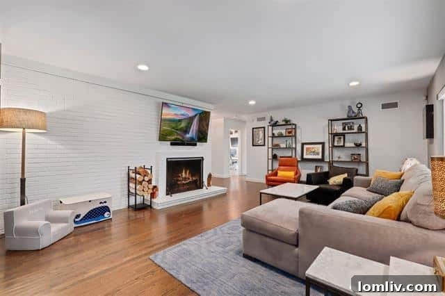 The stylish dining area featuring modern lighting and a harmonious open flow to other living spaces.