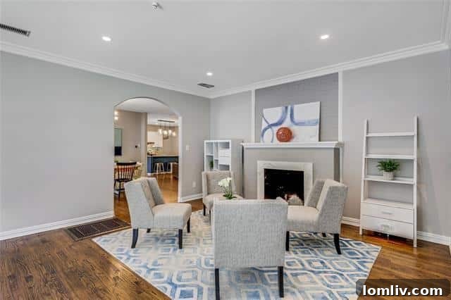 Sleek quartz kitchen with modern appliances in Lakewood bungalow