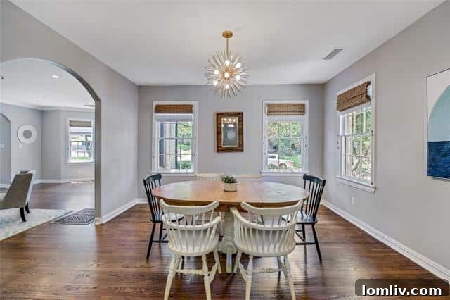 Spacious living room with natural light and hardwood floors