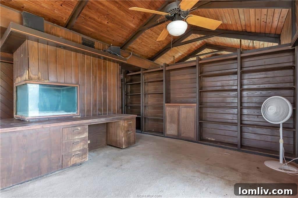 Conversation Pits The Second Chapter 12 Wide view of the conversation pit, showing its scale and the deteriorated condition of the surrounding carpet and walls.