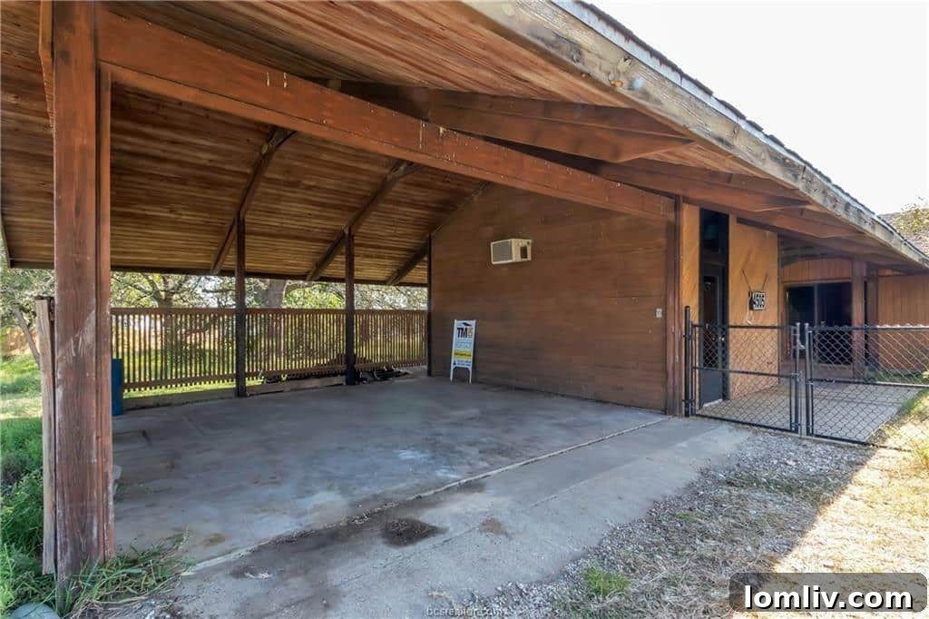 Conversation Pits The Second Chapter 4 Exterior shot of a dilapidated Midcentury Modern house with overgrown landscaping, hinting at extensive renovation needs.