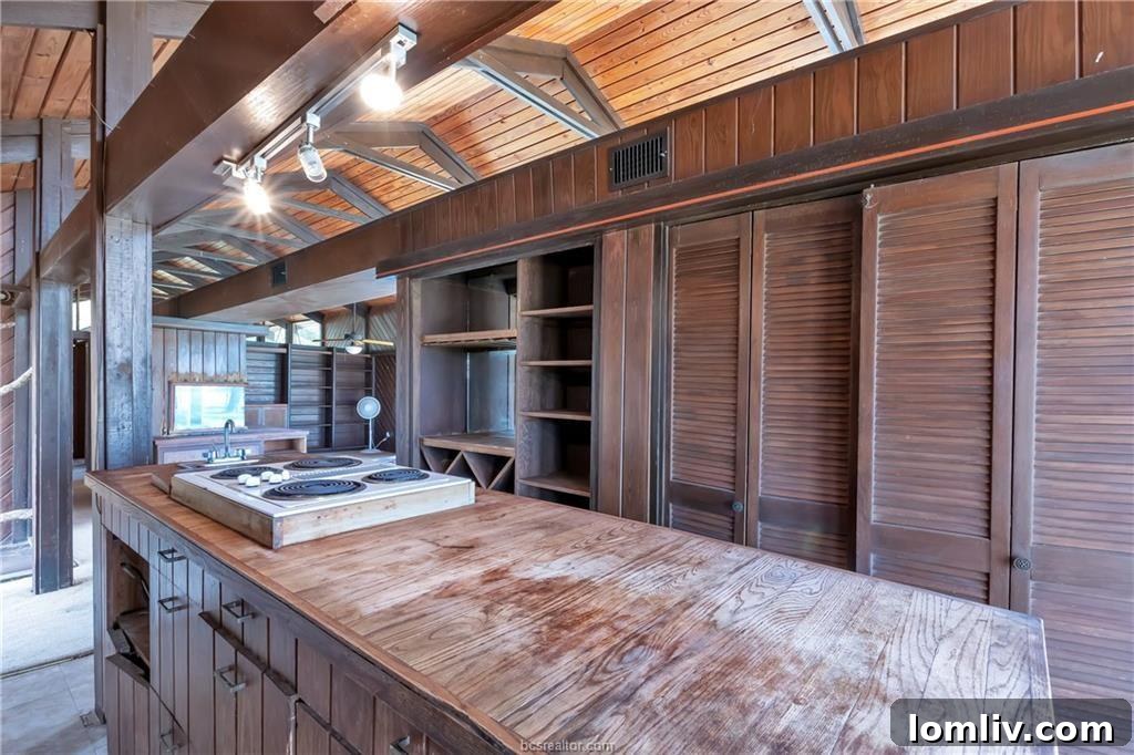 Conversation Pits The Second Chapter 8 Distorted view of a sunken conversation pit with tattered textiles and a fireplace, symbolizing the house's current state.