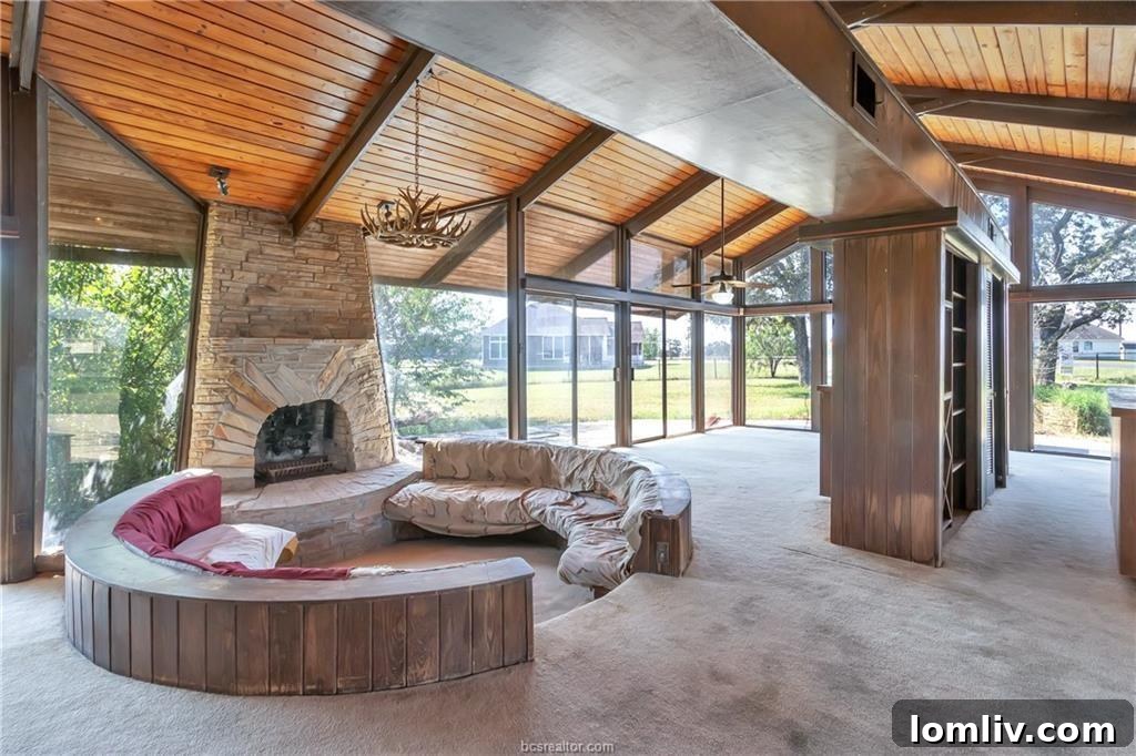 Conversation Pits The Second Chapter 9 Close-up of the conversation pit's dilapidated seating and fireplace area, highlighting the need for upholstery and structural repairs.