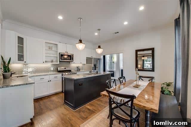 Kitchen or dining area with elegant cabinetry and lighting in the renovated Dallas home.