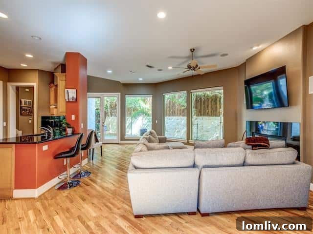 Stylish kitchen with maple cabinets and wine fridge