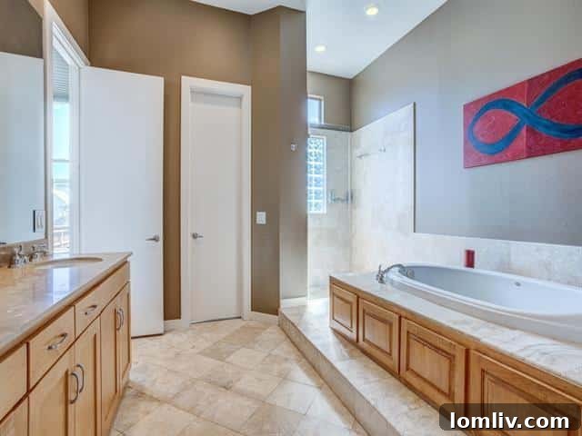 Elegant master bathroom with dual vanities